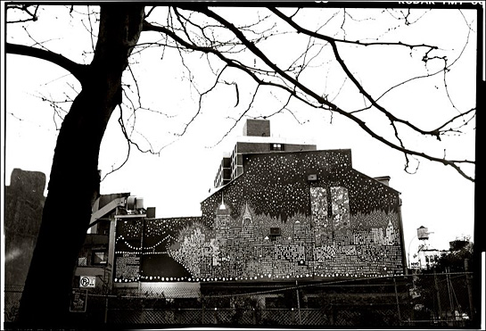 NY skyline painted on a house at dusk